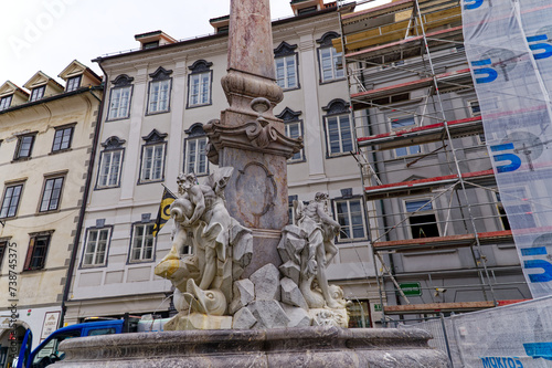 Famous fountain of the three Carniolan Rivers made by Francesco Robba at the old town City of Ljubljana on a cloudy summer day. Photo taken August 9th, 2023, Ljubljana, Slovenia.