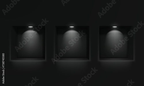 Three empty niches or shelves on a black wall with ice lamp lighting. Showcase, empty shelf for your product. photo