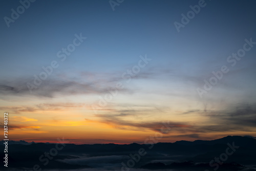 Beautiful skyline in sunrise over mountains