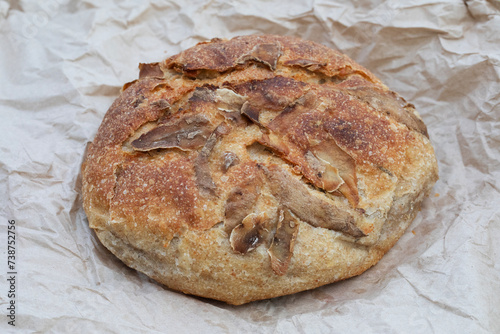 ARTISAN POTATO BREAD ON BROWN PAPER 

 photo