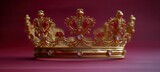 golden crown isolated on red