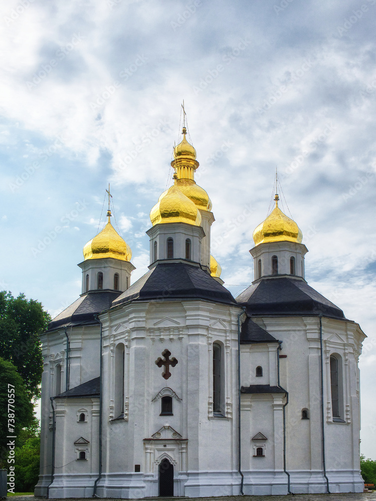 The golden domes of Catherine's Church are a beacon of splendor against the backdrop of Ukrainian Baroque architecture, with its white facade and five resplendent domes.