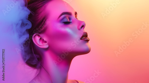portrait of beautiful female model posing on a gradient and smoke background