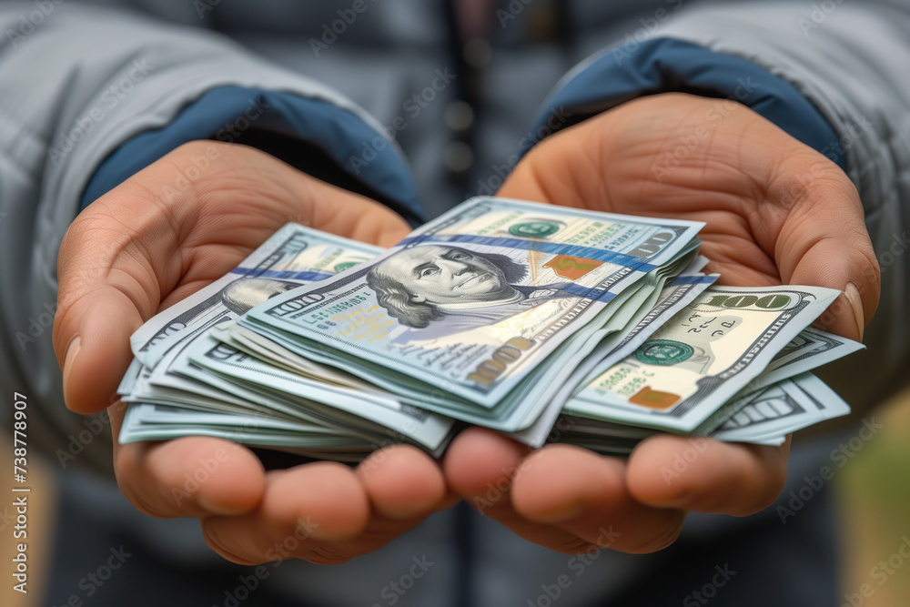 Hands holding US dollar money cash close up - obrazy, fototapety, plakaty 