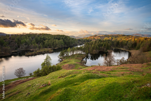 Obraz na plátně Golden hour at Tarn Hows near Ambleside on a calm Summer evening in The Lake District, UK