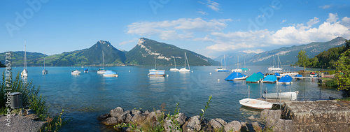 lake Thunersee with sailboats, summer panorama landscape, Bernese Oberland photo