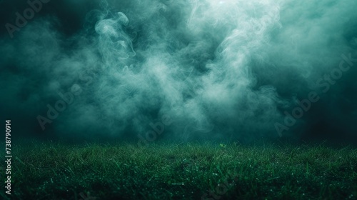 Soft green grass illuminated from above with swirling ethereal mist creating a mysterious and moody atmosphere