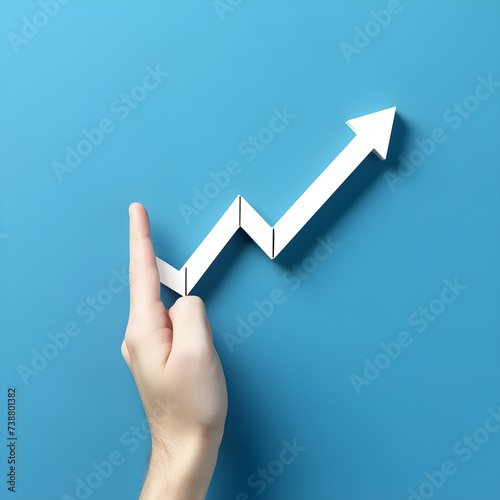 hand holding business success arrow