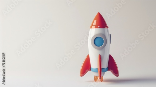 a toy rocket on a white surface