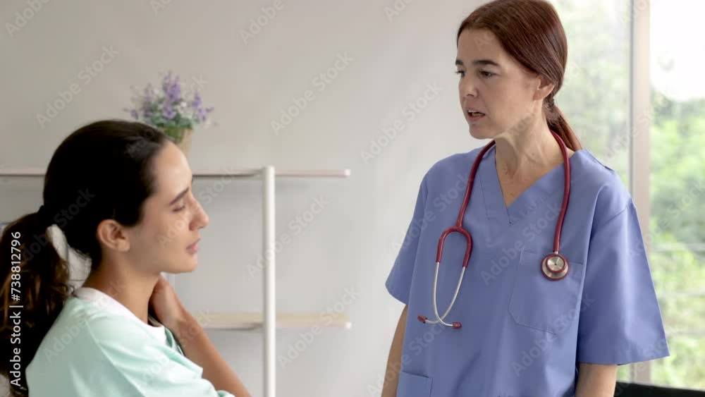 Hispanic orthopedic nurse carefully examines a patient's neck mobility, providing specialized musculoskeletal care, specialist assists injury female rehabilitation protocol for musculoskeletal health Hispanic orthopedic nurse carefully examines a patient's neck mobility, providing specialized musculoskeletal care, specialist assists injury female rehabilitation protocol for musculoskeletal health