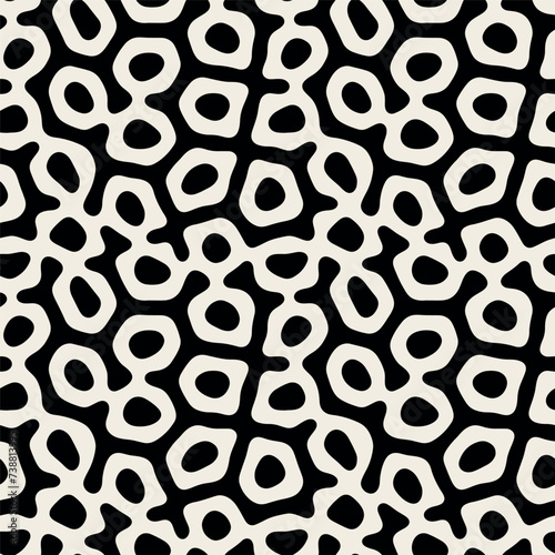 Vector seamless pattern. Monochrome organic shapes. Stylish structure of natural spots. Hand-drawn abstract background. Can be used as a swatch. Spotty monochrome print.