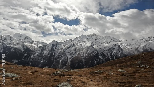 Beautiful view of snowcapped mountains surround you while reaching to the top of Tsergo Ri (4,990m) the high point on the Langtang valley trek of Nepal. photo