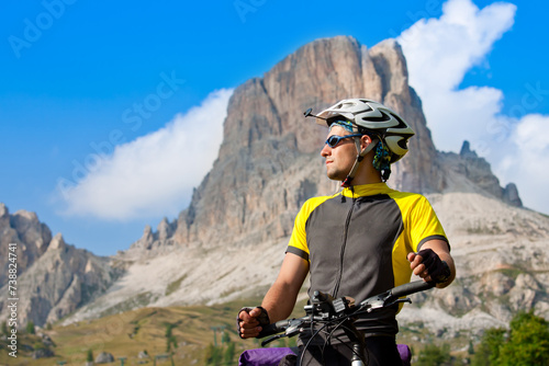 Mountain biker in Dolomites mountains. Travel, sport. active lifestyle concept