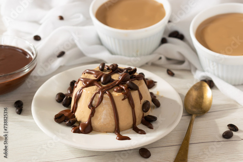 Coffee Panna Cotta dessert, traditional Italian panna cotta recipe on white background.