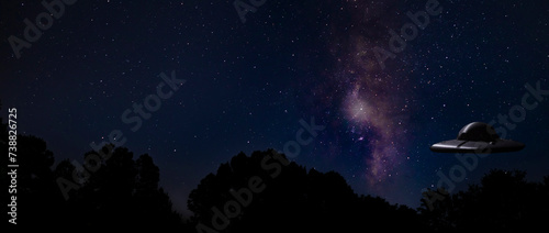 Fototapeta Naklejka Na Ścianę i Meble -  Milky Way and stars with a flying UFO