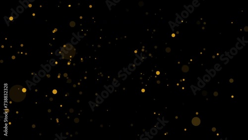Abstract  loop animation flickering glow orange gold bokeh bubble particles flow on black background. 4K 3D seamless looping orange bokeh particles dust fly in the air. photo