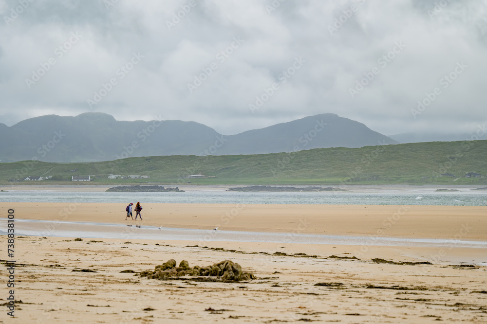 Five Finger Strand, one of the most famous beaches in Inishowen known for its pristine sand and rocky coastline with some of the highest sand dunes in Europe, county Donegal, Ireland. Five Finger Strand, one of the most famous beaches in Inishowen known for its pristine sand and rocky coastline with some of the highest sand dunes in Europe, county Donegal, Ireland.