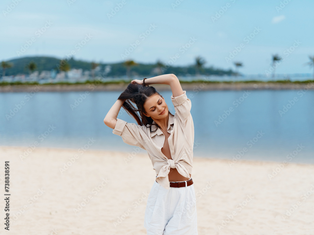 Summer Bliss: Attractive Young Woman Enjoying Vacation on a Tropical Beach Summer Bliss: Attractive Young Woman Enjoying Vacation on a Tropical Beach