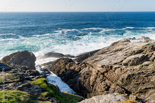 Rough and rocky shore at Malin Head, Ireland's northernmost point, Wild Atlantic Way, spectacular coastal route. Numerous Discovery Points. Co. Donegal