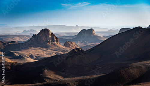 Hoggar landscape in the Sahara desert, Algeria. A view of the mountains and basalt organs that stand around the dirt road that leads to Assekrem.