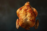 chicken with a golden color and a crispy skin and a professional overlay on the flip