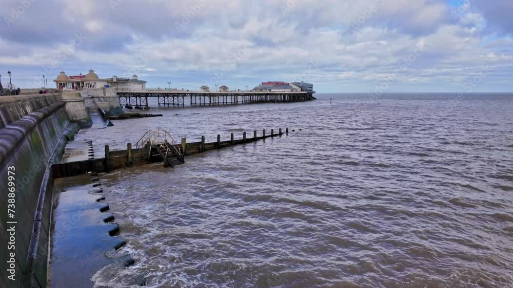 High tide at Cromer beach on the North Norfolk coast High tide at Cromer beach on the North Norfolk coast