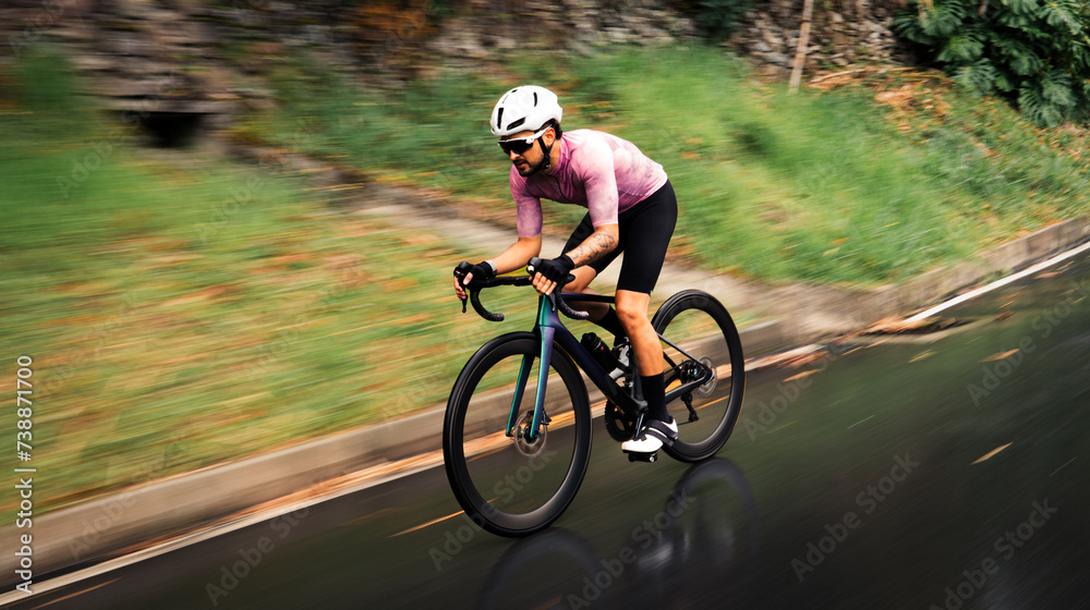 Naklejka premium Cyclist in action: a dynamic shot of a professional rider who is close to the finish line
