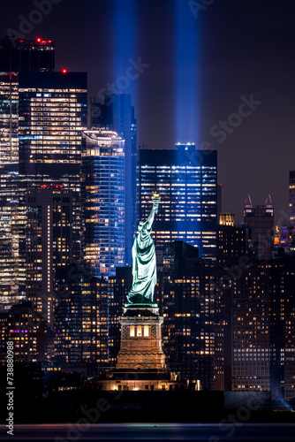 statue of liberty and tribute in light