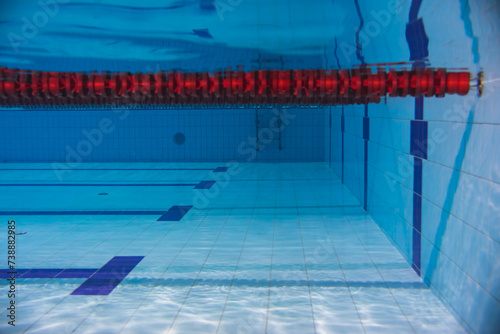 Path in a empty sports swimming pool, underwater photo.