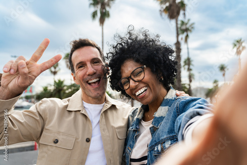Cuadro en lienzo Selfie portrait of multiracial adult couple or friends having fun