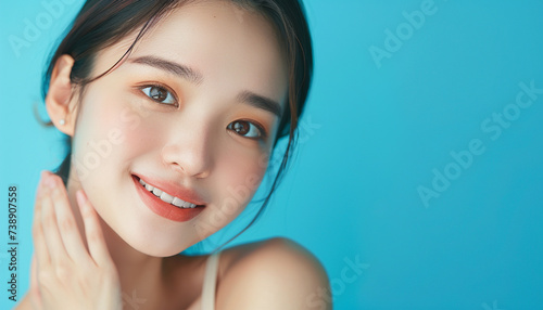 Skin care background with beautiful smiling asian girl model isolated