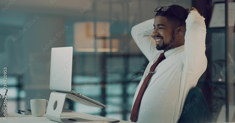 Relax, smile and young businessman in the office with complete legal project at night for overtime. Happy, calm and male lawyer with hands on head for rest with finished work on laptop in workplace.