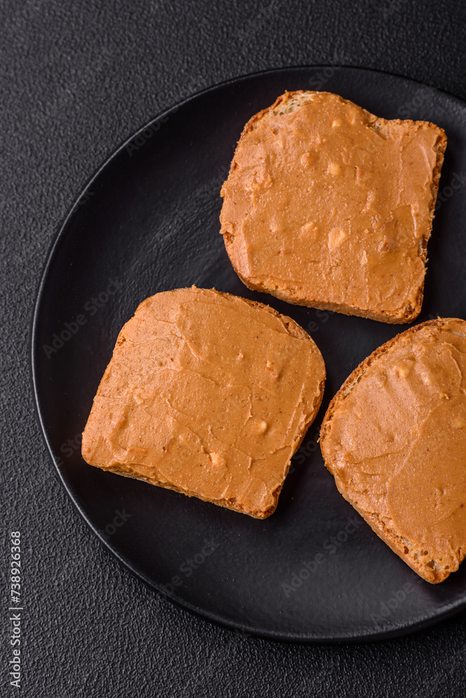 Delicious hearty sandwich with toast bread and peanut butter Delicious hearty sandwich with toast bread and peanut butter