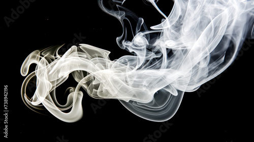 the smoke curls and swirls against a dark background, creating an intriguing and mysterious atmosphere.