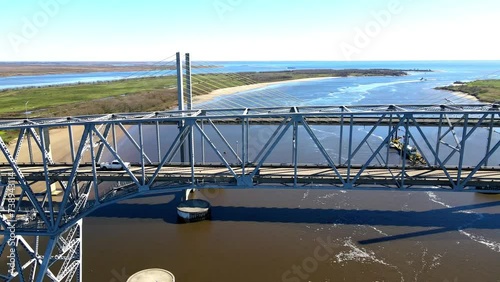 The Rainbow Bridge is a through truss bridge crossing the Neches River in Southeast Texas just upstream from Sabine Lake. State Highway 87 and State Highway 73 to connect Port Arthur photo