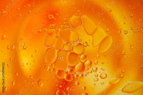 orange bubbles in a glass with drink