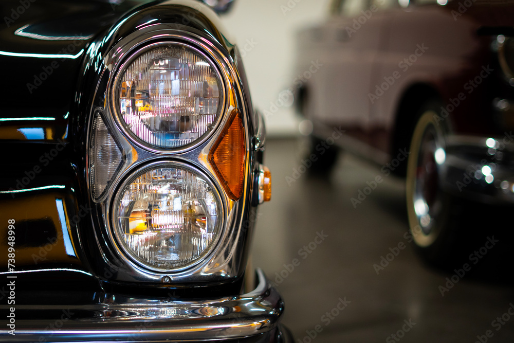 Headlight of an oldtimer black car