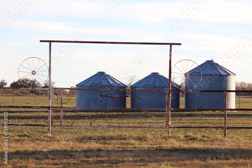 Grain Bins on a Texas Ranch behind a Gate