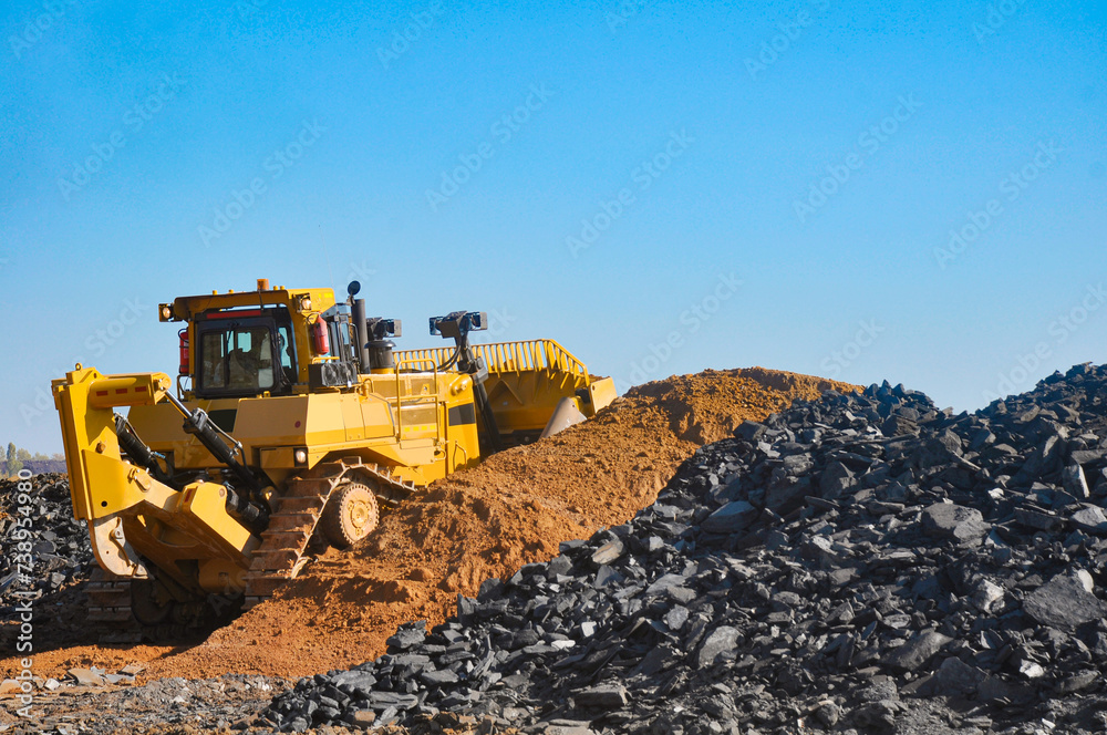 Bulldozer operation in the ore quarry. Daylighting Bulldozer operation in the ore quarry. Daylighting