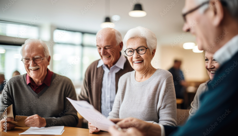 A group of joyful retirees gathers in a community center. Multiethnic group of professionals smiling in meeting. A group of joyful retirees gathers in a community center. Multiethnic group of professionals smiling in meeting.