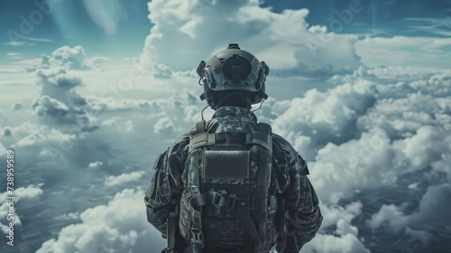 A soldier's gaze wanders from the pressure of duty to the freedom of the clouds above, longing for a moment of escape photo