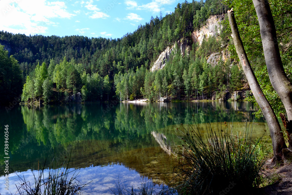 Obraz premium Rock city in Adrspach, Czech Republic. Quarry lake in Adrspach-Teplice Rocks Nature Park