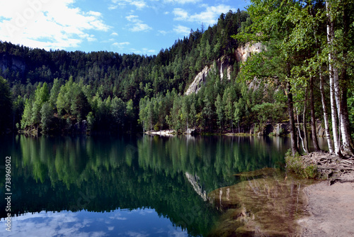 Fototapeta Naklejka Na Ścianę i Meble -  Rock city in Adrspach, Czech Republic. Quarry lake in Adrspach-Teplice Rocks Nature Park