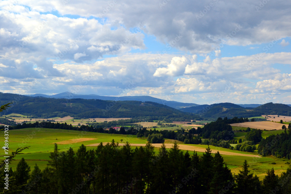 View point near the border of Poland and Czech Republic on  the Karkonosze Mountains - mountain chain of Sudeten Mountains (Sudetes). Summer landscape with Sniezka peak
