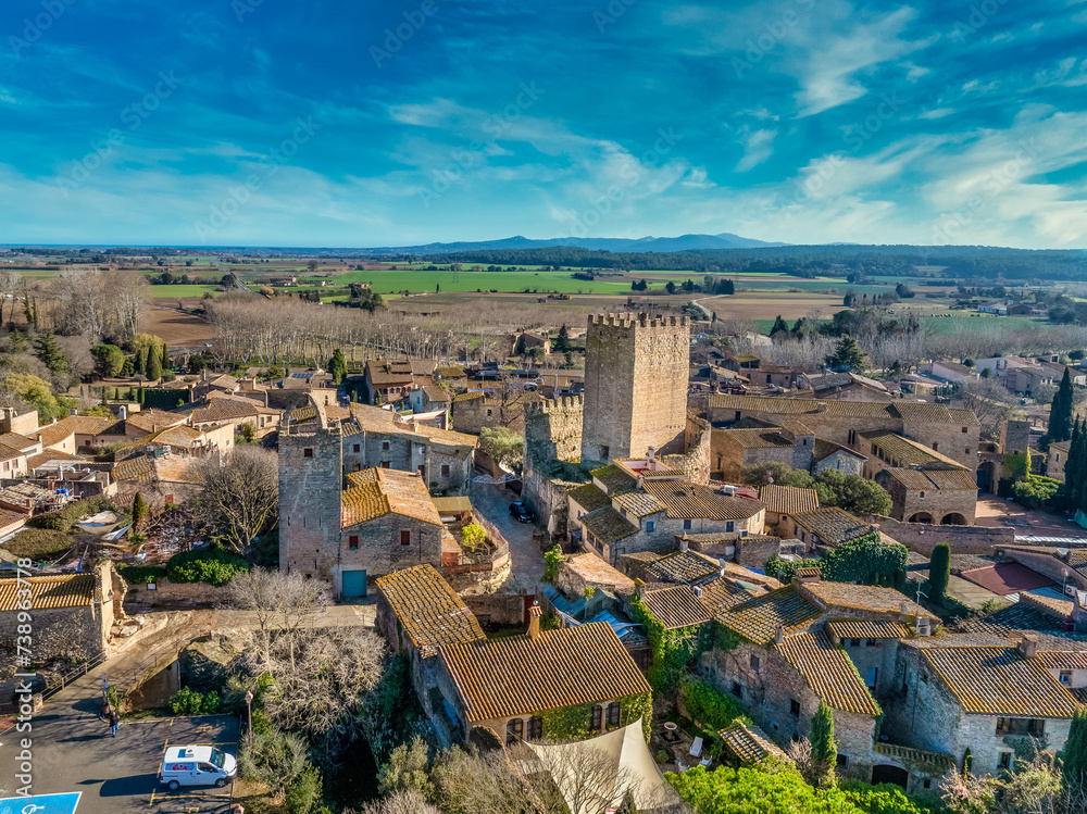 Aerial view of Peratallada, historic artistic small fortified medieval town in Catalonia, Spain near the Costa Brava. Beautiful of stone building rutted stone streets and passageways.Robin hood filmin