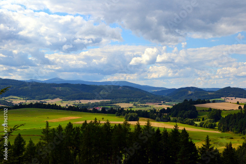 View point near the border of Poland and Czech Republic on the Karkonosze Mountains - mountain chain of Sudeten Mountains (Sudetes). Summer landscape with Sniezka peak