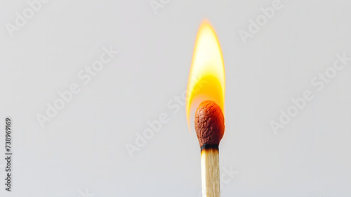 burning match on a black background