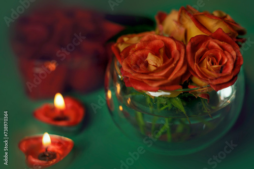 Bouquet of roses, candles and gifts, card for February 14, Valentine's Day, March 8, International Women's Day, wedding, birthday, mother's day, blurred background, bokeh.