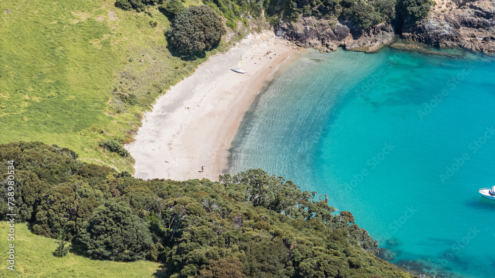 Aerial view of a paradisiac beach with crystal clear water in New Zealand