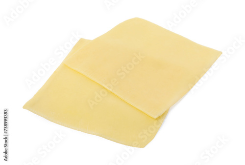 Slices of tasty fresh cheese isolated on white